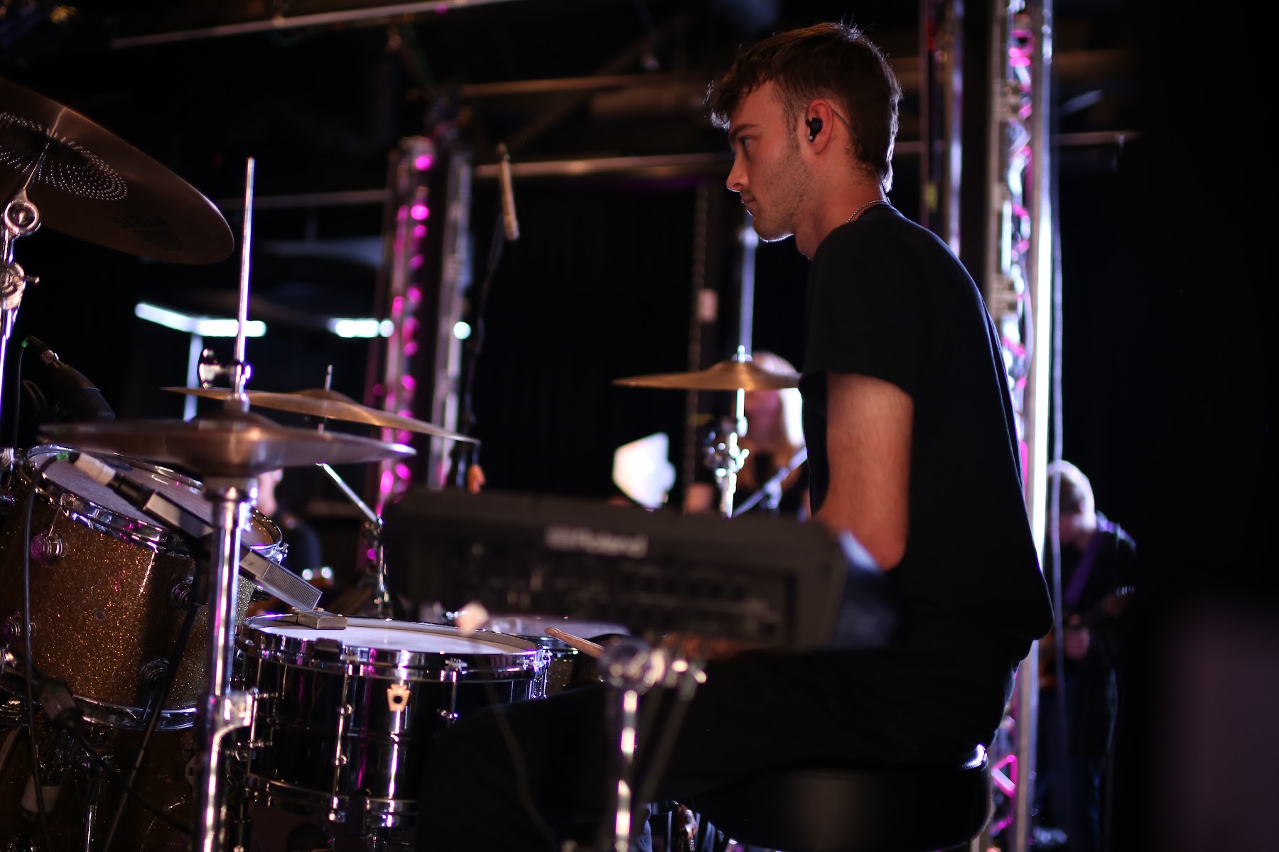 Drummer performing during the show